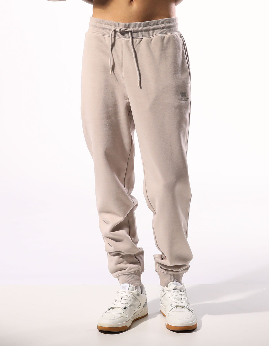 Beige Russell Athletic Brooklyn Cuffed Men Track pants | 24LFZKOHD